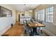 Elegant dining room with hardwood floors and stylish chandelier at 460 S Sherman St, Denver, CO 80209