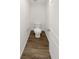 Small powder room with single toilet and wood-look flooring at 810 N Vandriver Way, Aurora, CO 80018