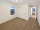 Bright bedroom with carpet flooring and double door closet at 810 N Vandriver Way, Aurora, CO 80018