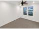 Well-lit bedroom featuring neutral walls and carpet floors at 810 N Vandriver Way, Aurora, CO 80018