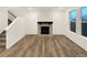 Living room with fireplace and hardwood floors at 810 N Vandriver Way, Aurora, CO 80018