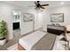 Main bedroom with ceiling fan and en-suite bathroom at 810 N Vandriver Way, Aurora, CO 80018