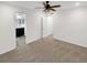 Spacious main bedroom with ceiling fan and en-suite bathroom at 810 N Vandriver Way, Aurora, CO 80018