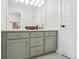 Bathroom featuring a modern vanity with stylish lighting and fixtures at 2934 Braeburn Way, Highlands Ranch, CO 80126