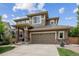 Charming two-story home with a two car garage and neutral colored siding at 2934 Braeburn Way, Highlands Ranch, CO 80126