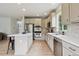 Bright, updated kitchen features stainless steel appliances and lots of cabinet space at 2934 Braeburn Way, Highlands Ranch, CO 80126