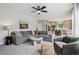 Open concept living area with modern decor and abundant natural light at 2934 Braeburn Way, Highlands Ranch, CO 80126