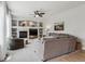 Comfortable living room with a fireplace and built-in shelving at 2934 Braeburn Way, Highlands Ranch, CO 80126