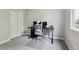 Comfortable office showcasing a modern adjustable desk, ergonomic chair, and ample space for productivity at 2934 Braeburn Way, Highlands Ranch, CO 80126