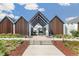 Welcoming entrance to the community pool area with modern architecture at 5880 Beeler Ct, Denver, CO 80238