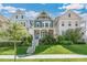 Charming two-story home with a welcoming front porch and well-manicured lawn at 5880 Beeler Ct, Denver, CO 80238