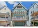 Charming two-story home with a large front porch and balcony on the second story at 5880 Beeler Ct, Denver, CO 80238