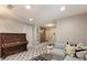 Comfortable living room with sleek decor, patterned floors, and a beautiful piano at 5880 Beeler Ct, Denver, CO 80238