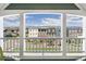 Scenic view from balcony overlooking a charming neighborhood, showcasing the desirable location at 5880 Beeler Ct, Denver, CO 80238