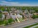 Aerial view of a charming home with a well-maintained front yard and surrounding neighborhood at 2421 N York St, Denver, CO 80205