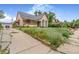 Charming home with awnings over the windows and a well-maintained front yard at 2421 N York St, Denver, CO 80205