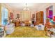 Spacious living room with a chandelier and traditional furniture, offering ample space at 2421 N York St, Denver, CO 80205