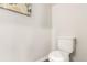 Clean powder room with a modern toilet and neutral wall color, creating a simple and functional space at 1353 Reynolds St # 16B, Fort Lupton, CO 80621