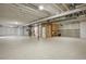 Unfinished basement with high ceilings, offering a blank canvas for customization and additional living space at 27381 E Lakeview Dr, Aurora, CO 80016