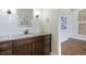 Modern bathroom features white subway tile, a gray countertop, stylish light fixtures at 27381 E Lakeview Dr, Aurora, CO 80016