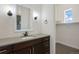 Modern bathroom features white subway tile, a gray countertop, and a walk-in closet at 27381 E Lakeview Dr, Aurora, CO 80016