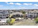 Aerial view showcasing the backyard, patio, pergola, and water feature, blending indoor and outdoor living seamlessly at 27381 E Lakeview Dr, Aurora, CO 80016