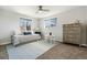 Bright bedroom with a daybed, table and chairs and a beautiful view from the window at 7076 W 83Rd Way, Arvada, CO 80003