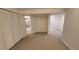 Spacious basement area leading to a bathroom and stairs at 8094 Kline Ct, Arvada, CO 80005