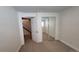 Cozy bedroom with mirrored closet doors and neutral carpet at 8094 Kline Ct, Arvada, CO 80005