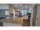 Updated kitchen with stainless appliances, granite counters, and modern cabinetry at 8094 Kline Ct, Arvada, CO 80005