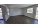 Bright, airy living room with hardwood floors and slider patio door at 8094 Kline Ct, Arvada, CO 80005