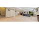 Spacious finished basement featuring neutral carpeting, ample lighting, and room for various activities at 5134 S Ouray Ct, Centennial, CO 80015