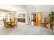 Open dining room with hardwood floors and stylish lighting at 5134 S Ouray Ct, Centennial, CO 80015