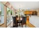 Dining room with lots of natural light, a chandelier, and slider doors to the exterior at 5134 S Ouray Ct, Centennial, CO 80015