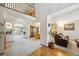 Spacious entryway with an open floor plan and hardwood flooring accents at 5134 S Ouray Ct, Centennial, CO 80015