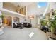 Open-concept living area with vaulted ceilings and a loft, creating a spacious feel at 5134 S Ouray Ct, Centennial, CO 80015