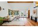 Spacious living room features vaulted ceilings, many windows and access to the backyard at 9390 W 14Th Ave, Lakewood, CO 80215