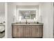 Elegant bathroom with double vanity and modern finishes at 2393 King St, Denver, CO 80211