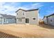 Two-story house back view, gray siding, backyard at 13402 E 110Th Way, Commerce City, CO 80022