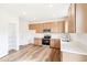 Modern kitchen with stainless steel appliances and light wood cabinets at 13402 E 110Th Way, Commerce City, CO 80022