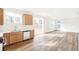 Open concept kitchen with stainless steel appliances and access to backyard at 13402 E 110Th Way, Commerce City, CO 80022