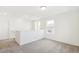 Bright loft area features neutral carpet and plenty of natural light at 13402 E 110Th Way, Commerce City, CO 80022