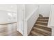 Modern staircase leading to the upper level at 13402 E 110Th Way, Commerce City, CO 80022