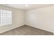 Neutral bedroom with carpet, and a window with blinds allowing natural light at 816 Leeward St, Lochbuie, CO 80603