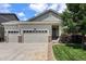 Charming home featuring a three-car garage and inviting front yard landscaping at 3406 Quicksilver Rd, Frederick, CO 80516