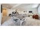 Finished basement complete with a ping pong table, seating area, and aquarium at 5134 Queen Ct, Arvada, CO 80002