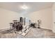 Carpeted bonus room featuring natural light, and is arranged with musical instruments at 5134 Queen Ct, Arvada, CO 80002