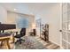 Bright home office featuring a desk, chair, and natural light at 5134 Queen Ct, Arvada, CO 80002