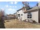 Backyard features a fire pit, landscaping, and a stained wood fence at 96 S Lindsey St, Castle Rock, CO 80104