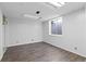 Finished basement area with neutral walls, vinyl floors and a window at 96 S Lindsey St, Castle Rock, CO 80104